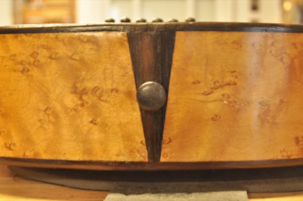 Endpin and rosewood tailblock addition on Thibouville-Lamy French romantic guitar with curly maple sides