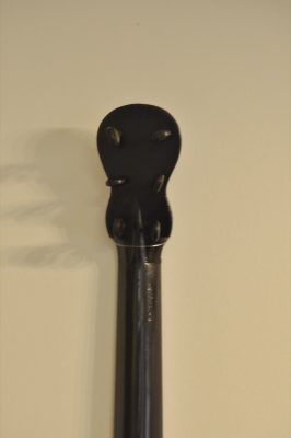 Headstock of Thibouville-Lamy romantic guitar with six granadillo tuning pegs in figure-eight pegbox