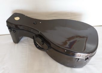 Closed black hardshell case for the Le Luth Doré renaissance lute, with minor exterior coating chips
