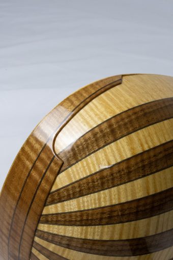 Back of the Chiara Frisio Baroque mandolin showing alternating flamed maple and flamed walnut ribs with thin spacers