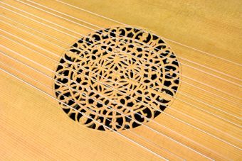 Detail of the intricately carved rosette on the spruce soundboard of the Jaume Bosser Renaissance lute